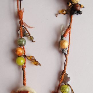 Cosa Nostra Handmade Necklace - HappyKidOrangeMix. Χειροποίητο κολιέ από χειροποίητο, εισαγόμενο Voodoo Doll, υφασμάτινη βάση κεντημένη, μεταλλικά στοιχεία, χάντρες (χειροποίητες, γυάλινες, ξύλινες, απλές), Swarovski, οργάντζα σε κορδόνι και σπάγγο με κούμπωμα- ξύλινο κουμπί. Μάκρος 38cm.