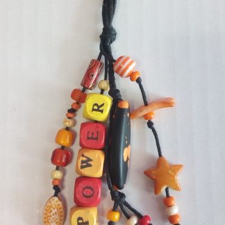 Cosa Nostra Handmade Key Ring POWER & STAR. Χειροποίητο μπρελόκ από μαύρο κορδόνι σε κίτρινο-κόκκινο-πορτοκαλί συνδυασμό από χάντρες (ξύλινες, κεραμικές, απλές), κεραμικό αστέρι, ψαράκι. Mήκος 3cm διάμετρος κρίκου, συνολικό 14cm.